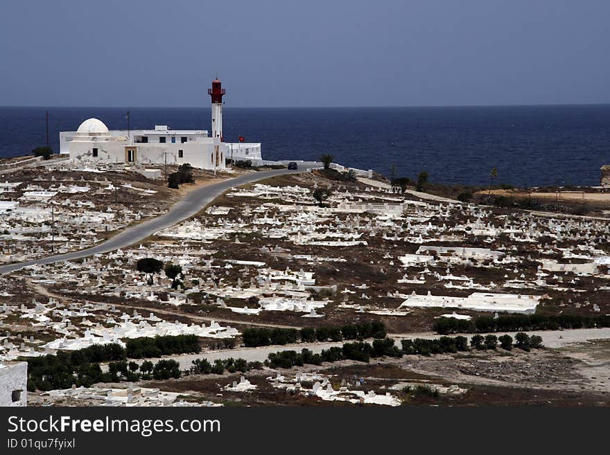 Muslim cemetery and lighthouse in Mahdia - seaside town in northern Tunisia