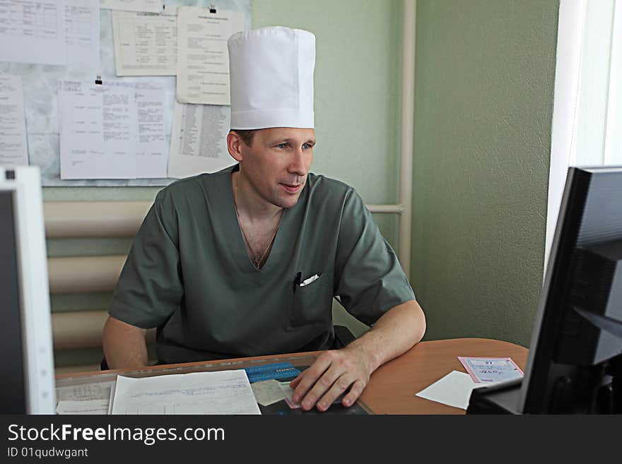 Medical theme: a doctor in a work process. Medical theme: a doctor in a work process.