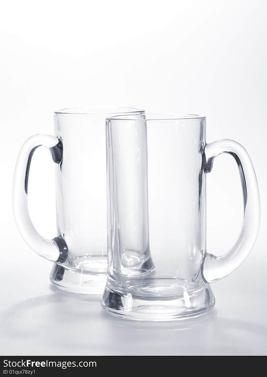 Two empty mugs for beer on the table