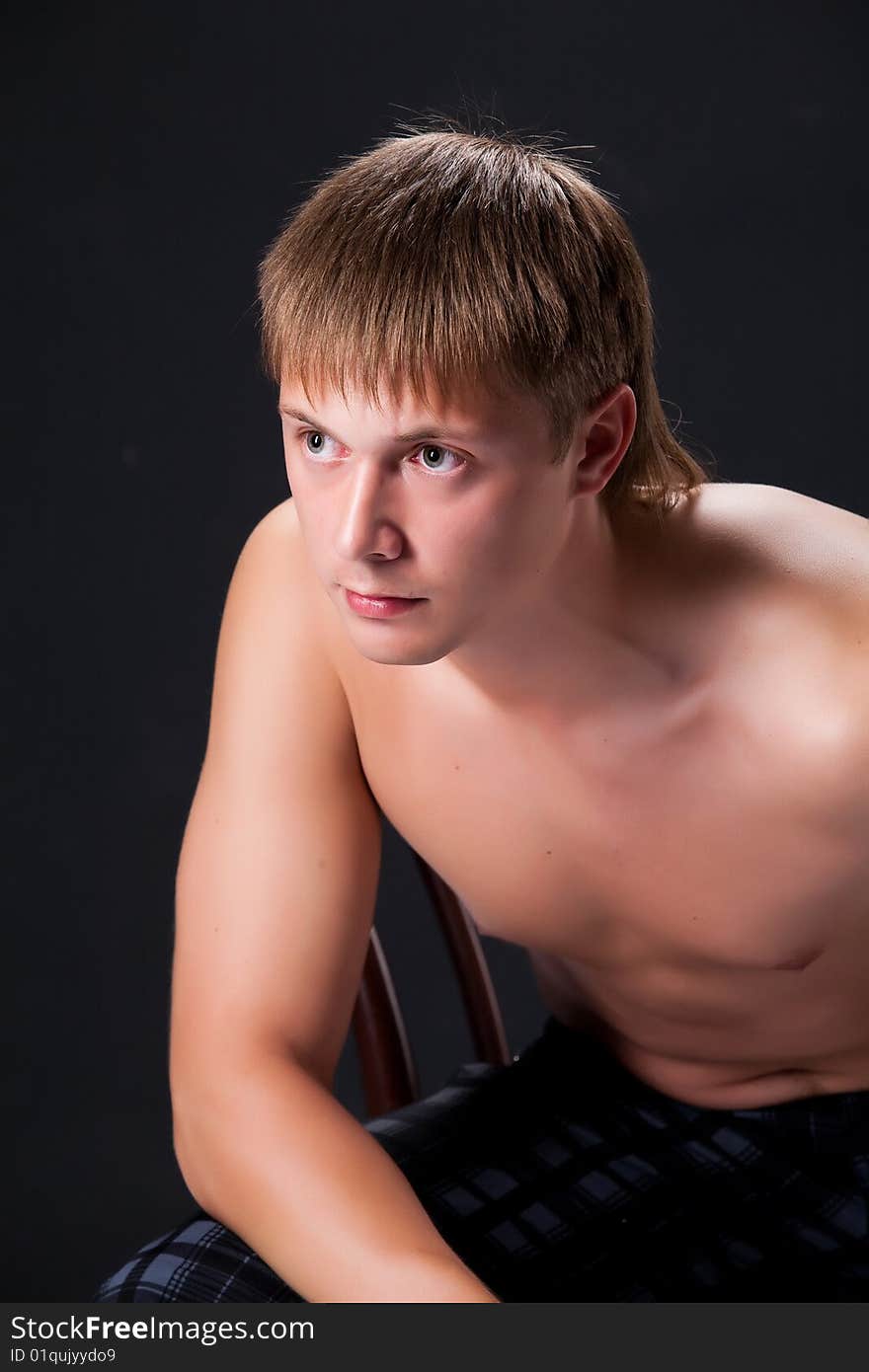 Young handsome man on black background. Young handsome man on black background