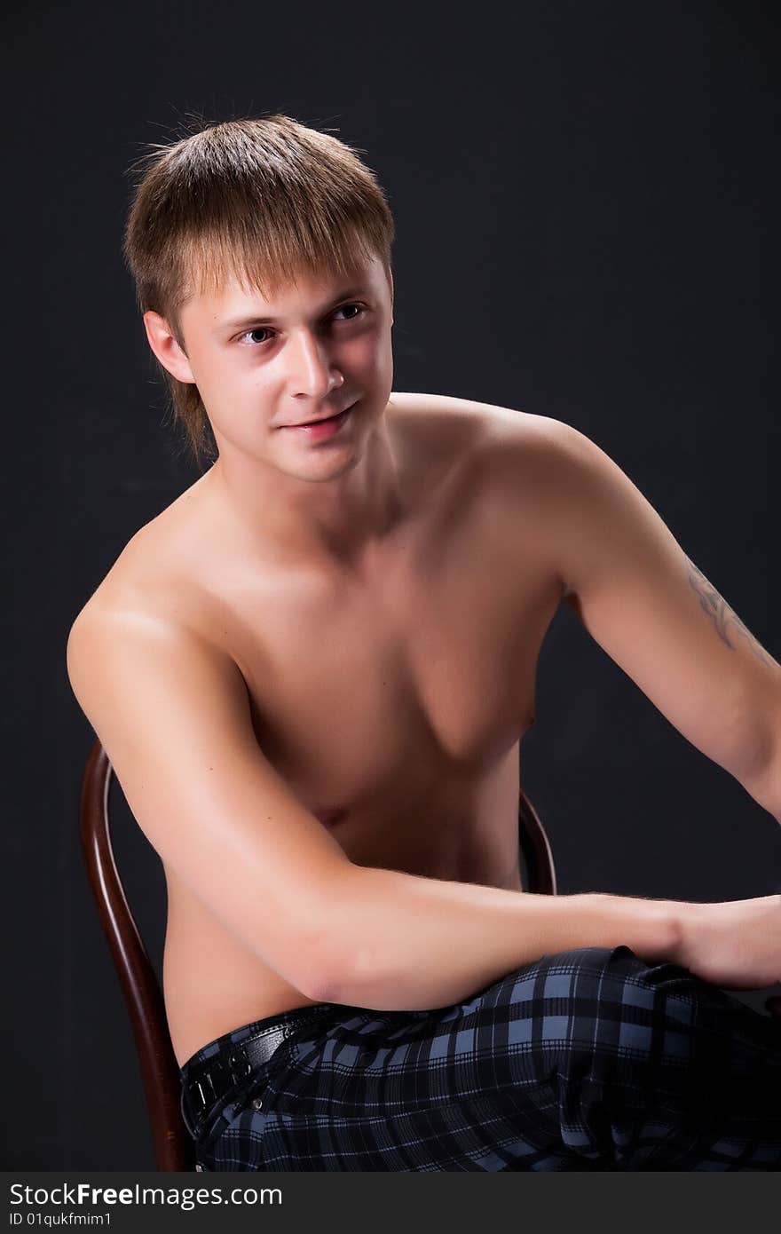 Young handsome man on black background. Young handsome man on black background