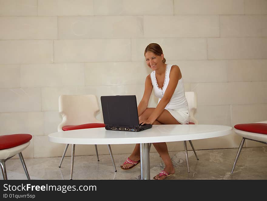 A Woman Using A Laptop