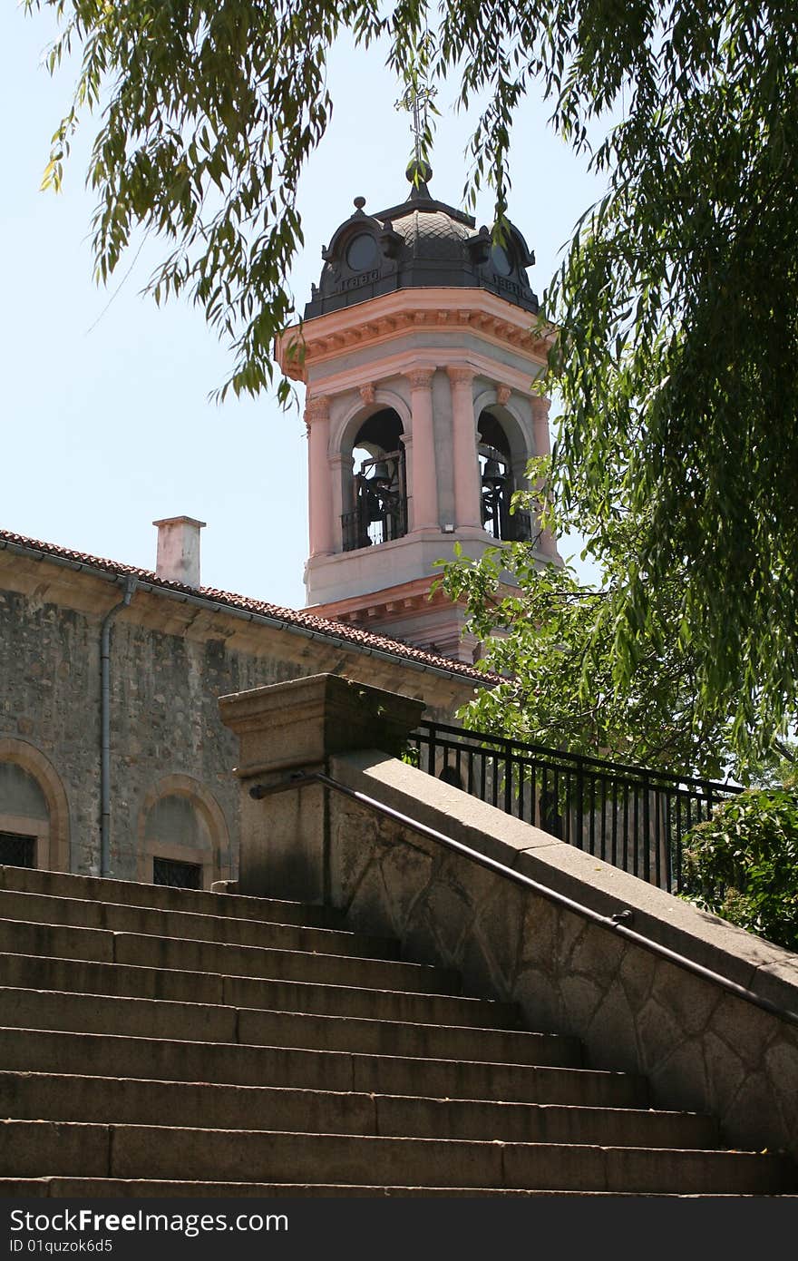 Scene with christian church and tree