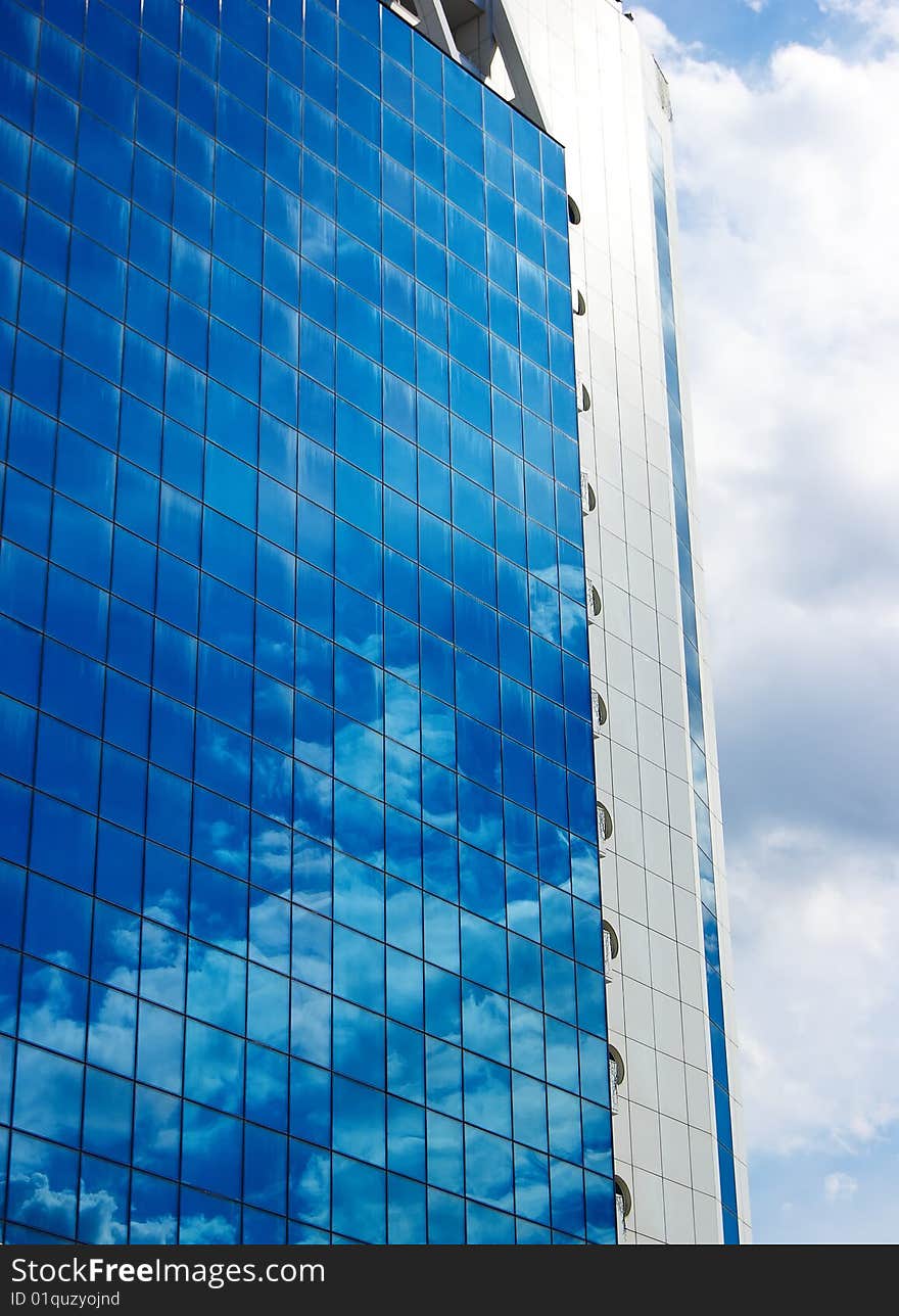 Modern building, reflections and sky