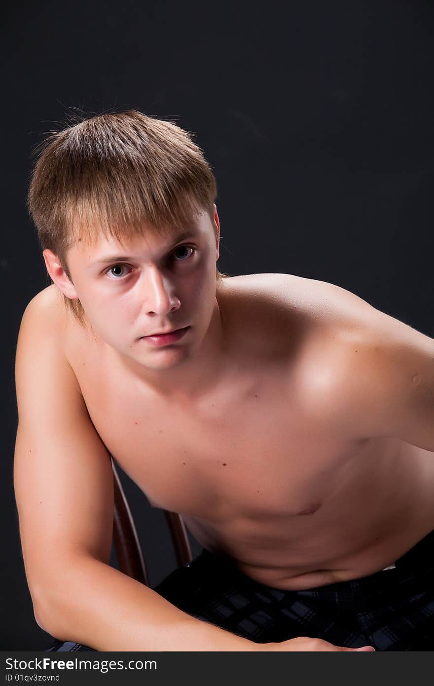 Young handsome man on black background. Young handsome man on black background