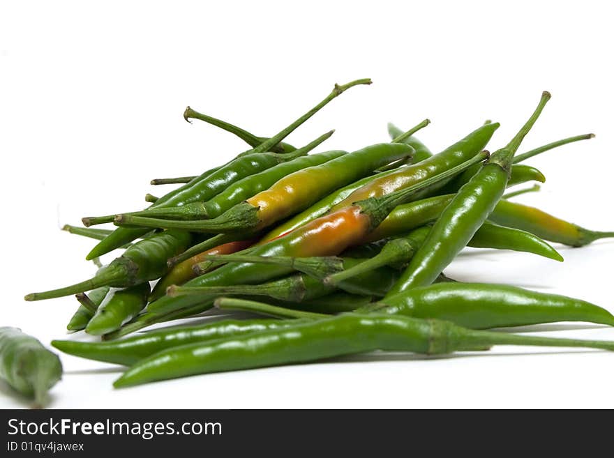 A bunch of green chili pepper. A bunch of green chili pepper