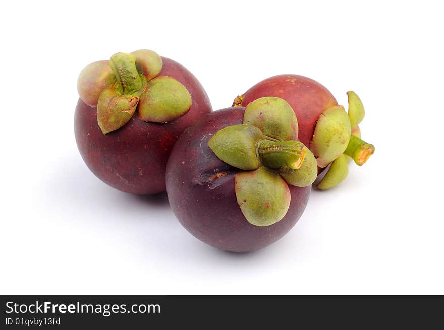 Asian fruit purple mangoesteen white background