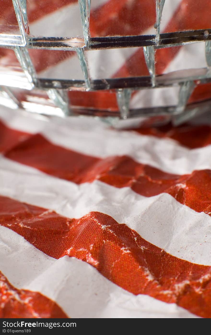 Mirror disco ball on american flag, red and white stripes. Mirror disco ball on american flag, red and white stripes