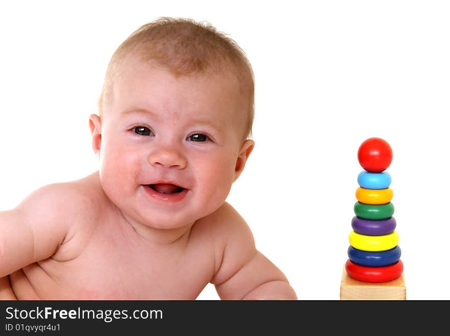 Happy baby with bright toy