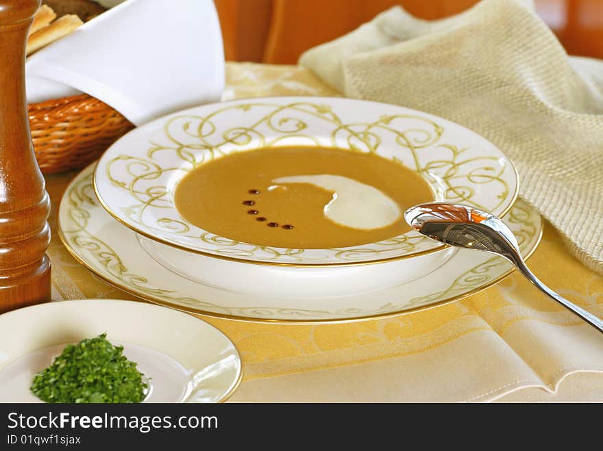 Cream soup with sauce and spices