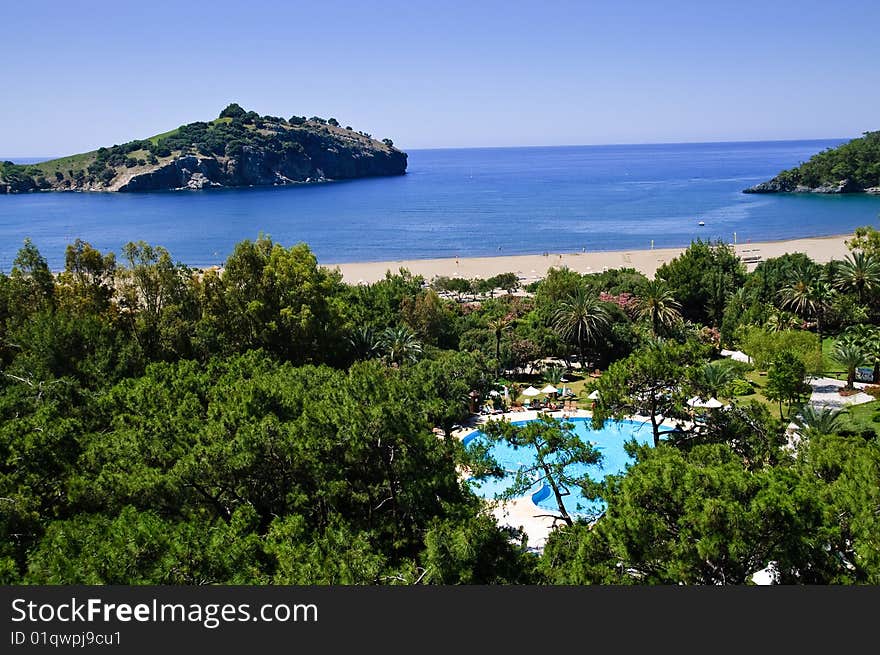 Coastline and pool of tropical resort. Coastline and pool of tropical resort