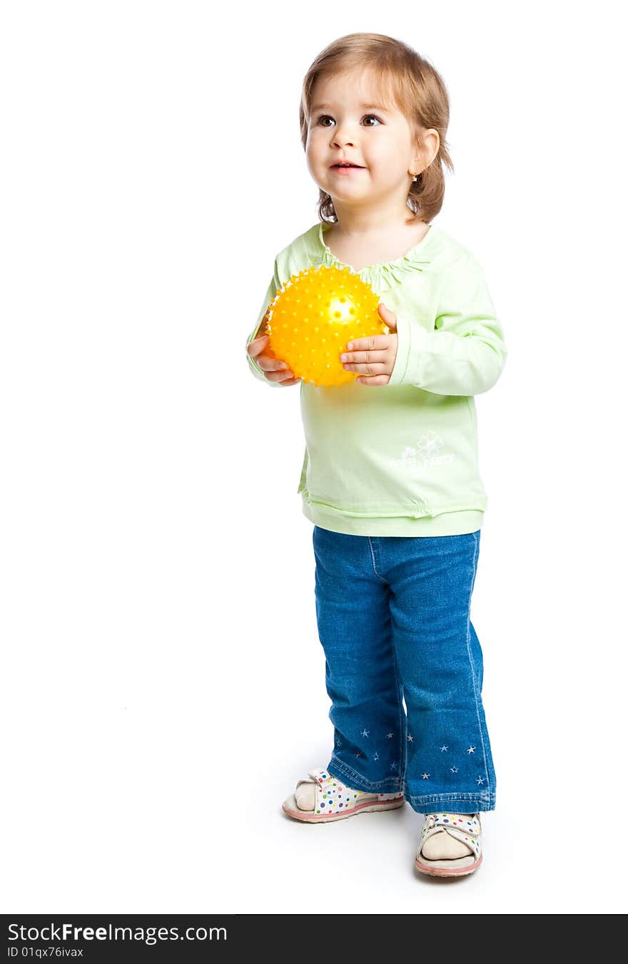 Little girl with yellow ball in hands. Isolated on white background