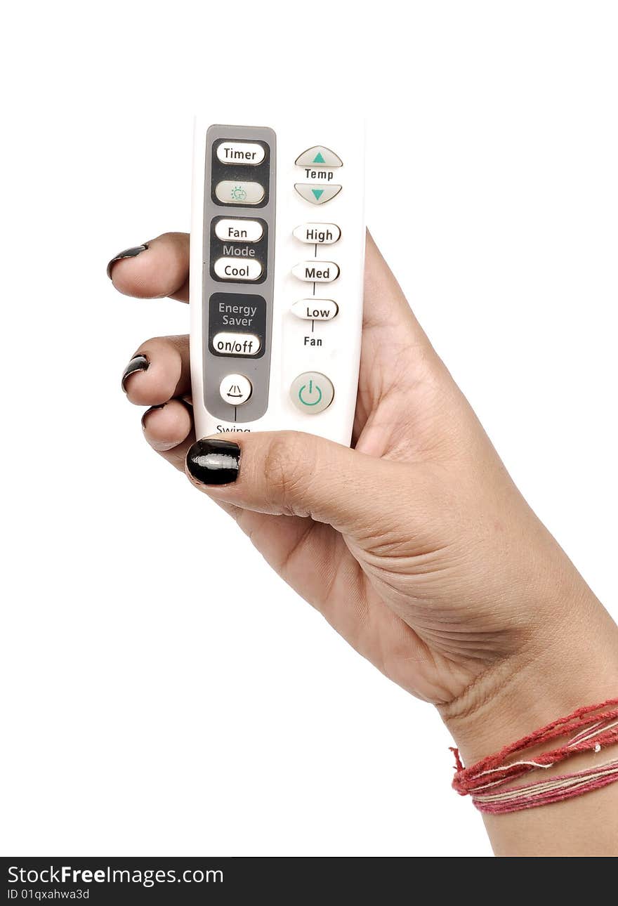 Female hand with white remote. Female hand with white remote.