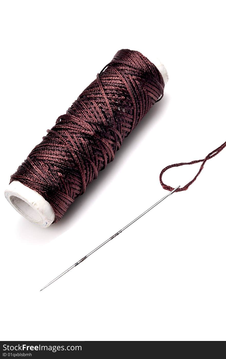 Thread spindle and needle