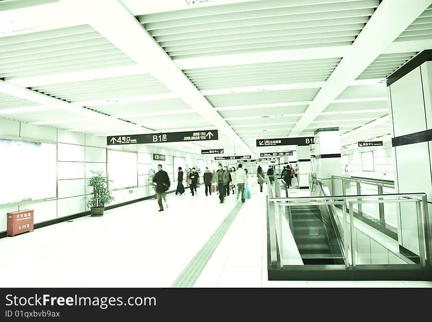 Passengers at the airport, motion blur