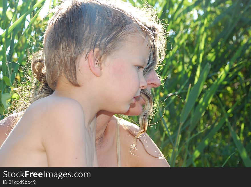 Mother and son on the summer beach