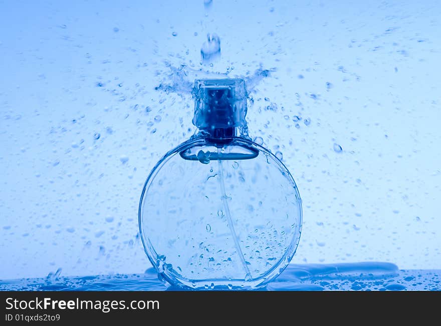 Perfume bottle and drop water