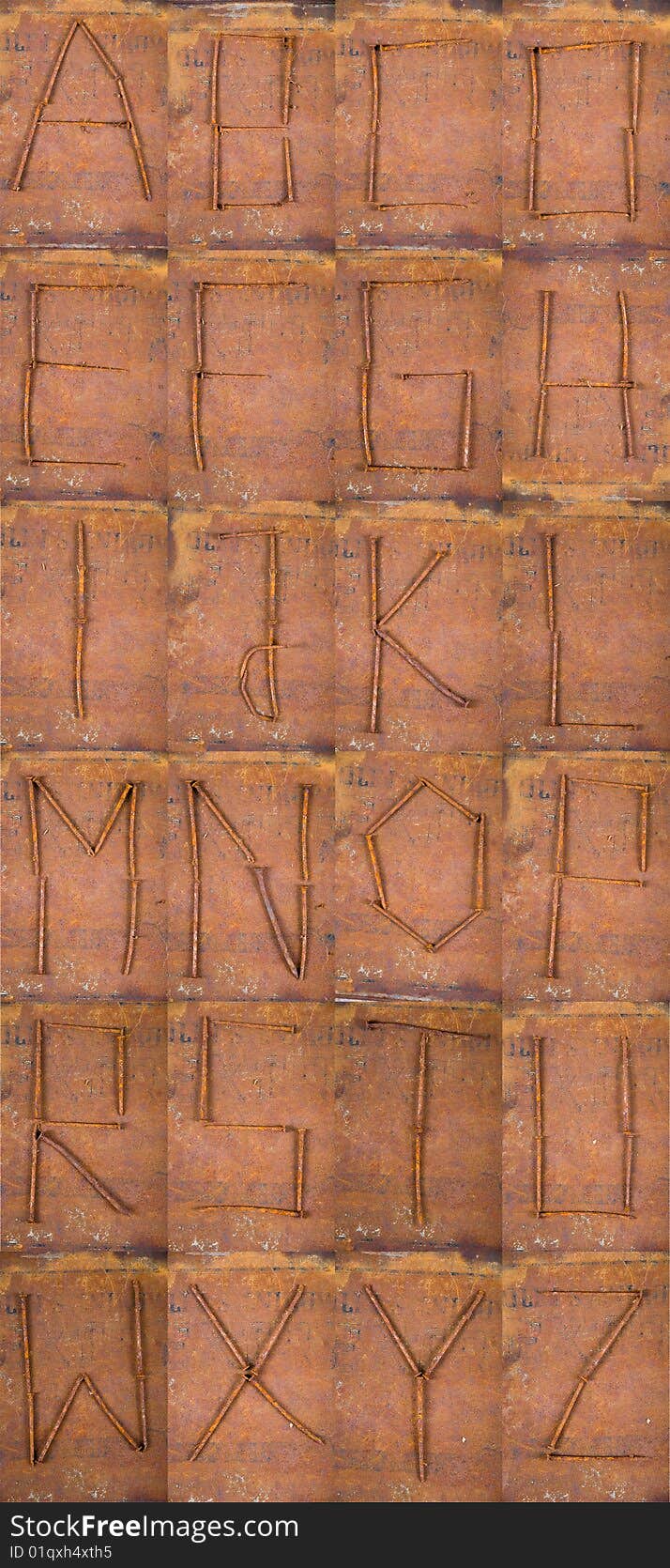 Rusted alphabet made with nails