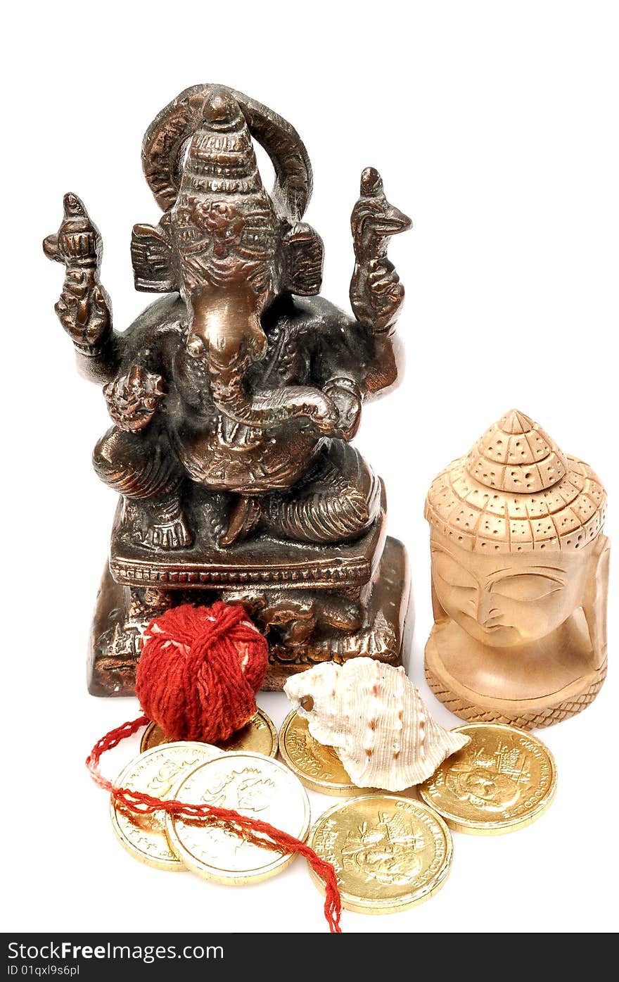 Lord Ganesha and Buddha with offerings isolated on white background.