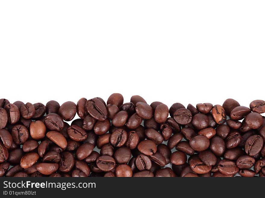 Coffee beans lined up horizontal