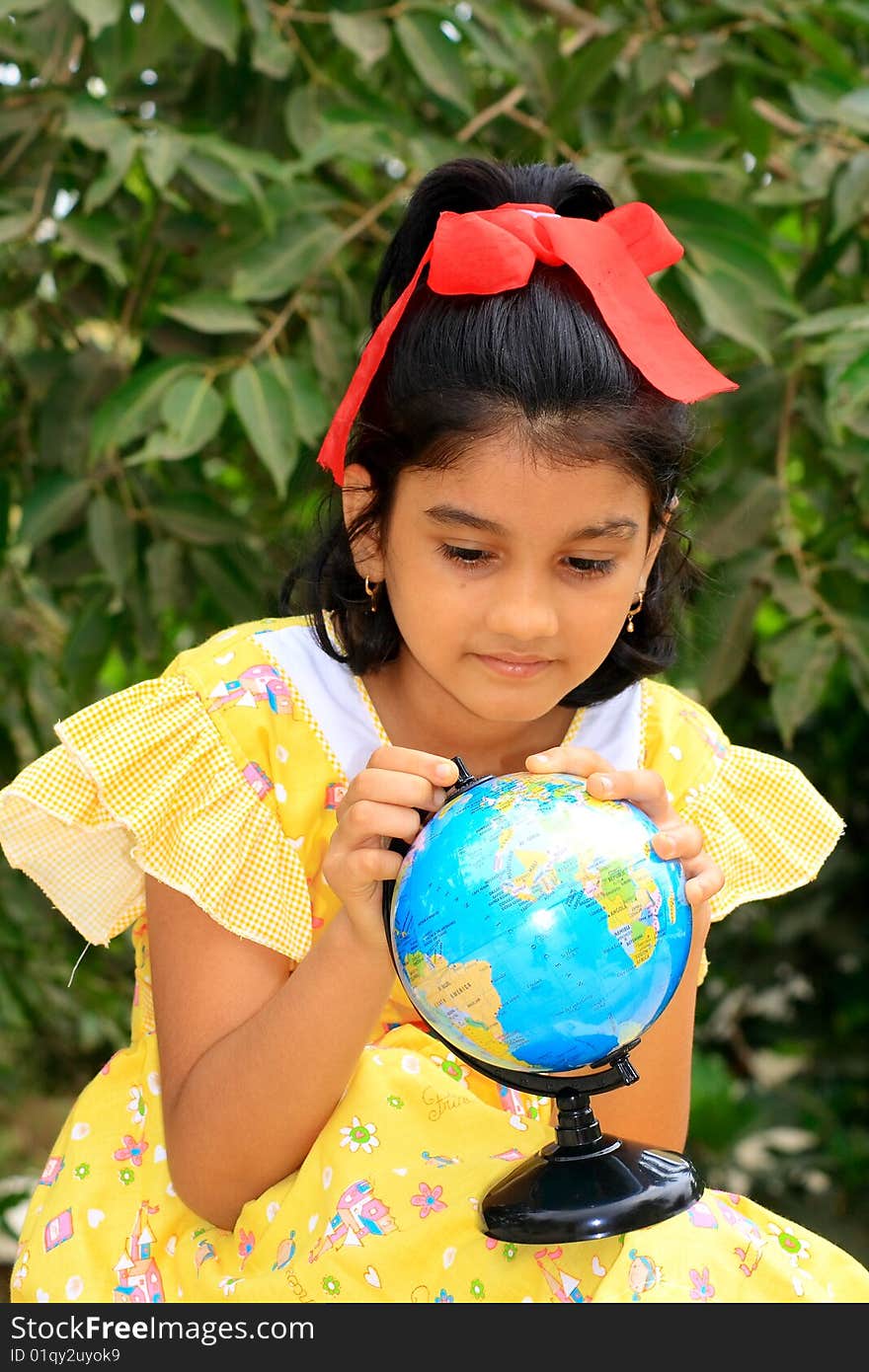 Girl Exploring The Globe