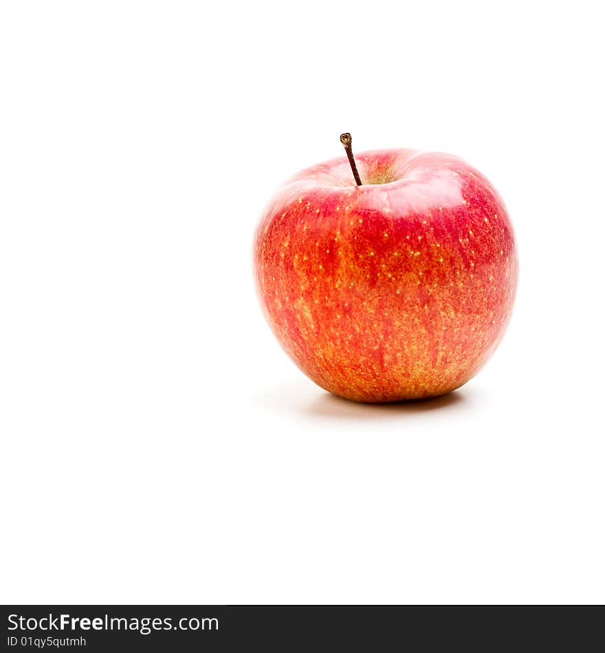 Delicious red apple on a white background