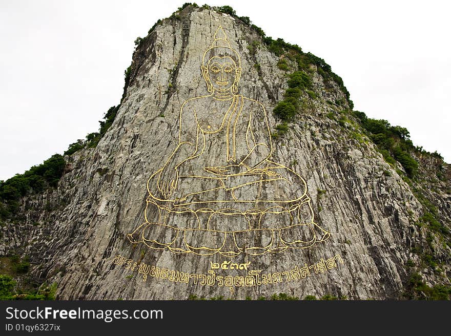 Engraving Of Buddha Image On Surface Of Mountain