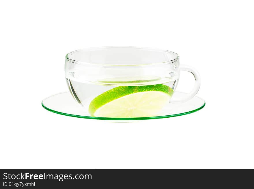 Cup of water with lemon, isolated on white background