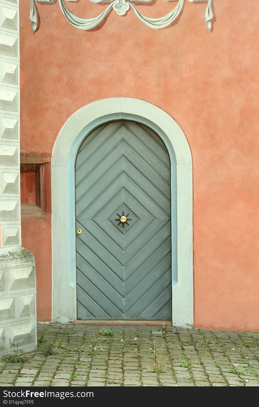 Old wooden door and stone brick wall