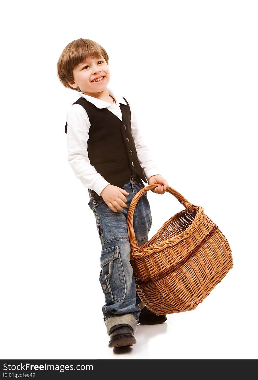 Handsome little boy holding basket, isolated on white