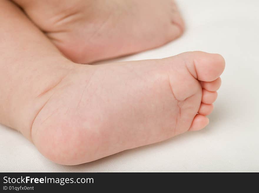 Photo of babie's feet, isolated on white. Photo of babie's feet, isolated on white