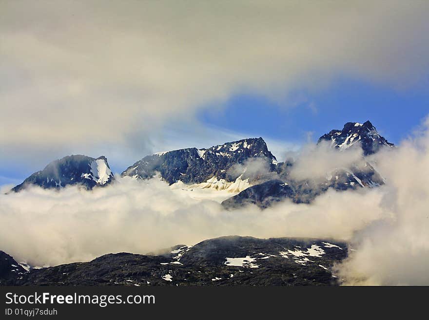 Rustic View Of Mountains With Clouds In The Yukon