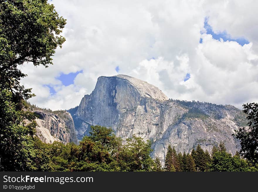 Yosemite National Park.  View of Half Dome with storm coming in.  This image was processed to increase dynamic range. Yosemite National Park.  View of Half Dome with storm coming in.  This image was processed to increase dynamic range