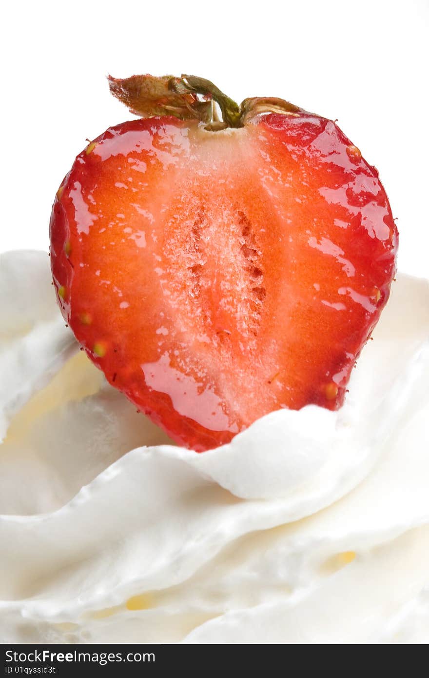 Strawberries in cream on a white background