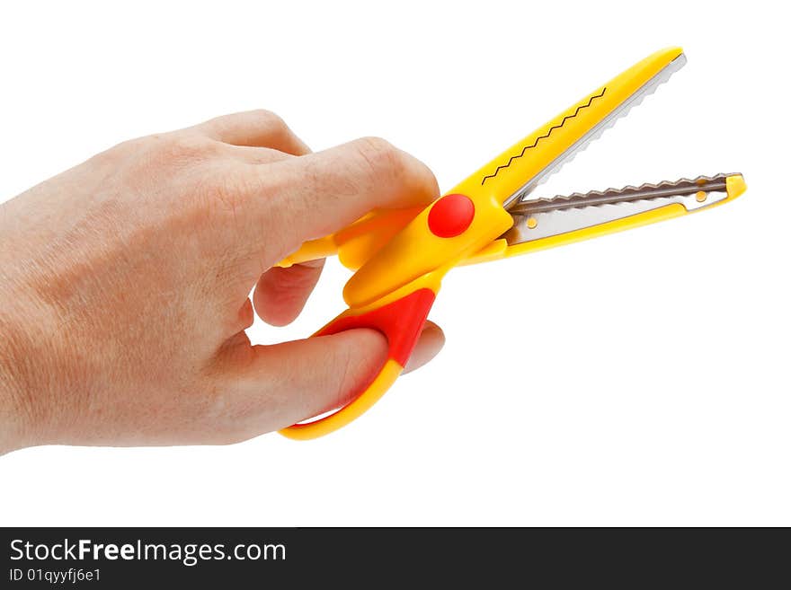 Hand with the scissors on a white background