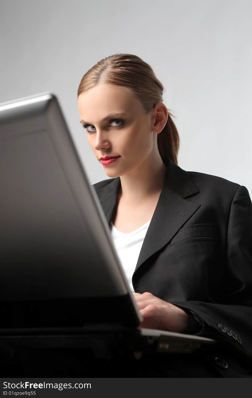 A business woman with laptop. A business woman with laptop