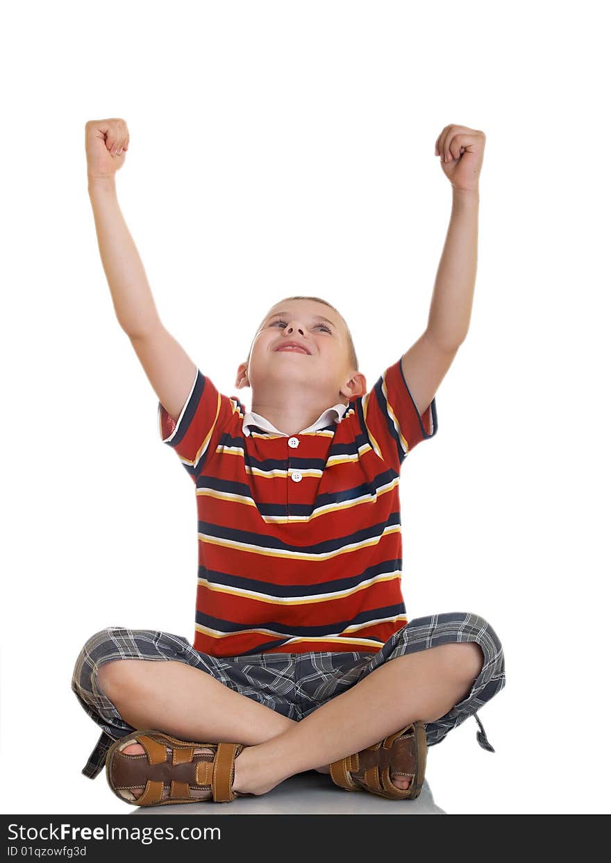 The boy shows gestures by two hands. The boy shows gestures by two hands