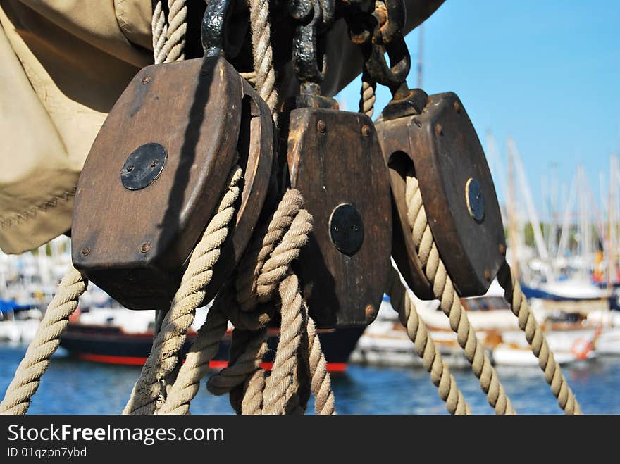 Fragment of a rigging and ropes placed on a yacht. Fragment of a rigging and ropes placed on a yacht