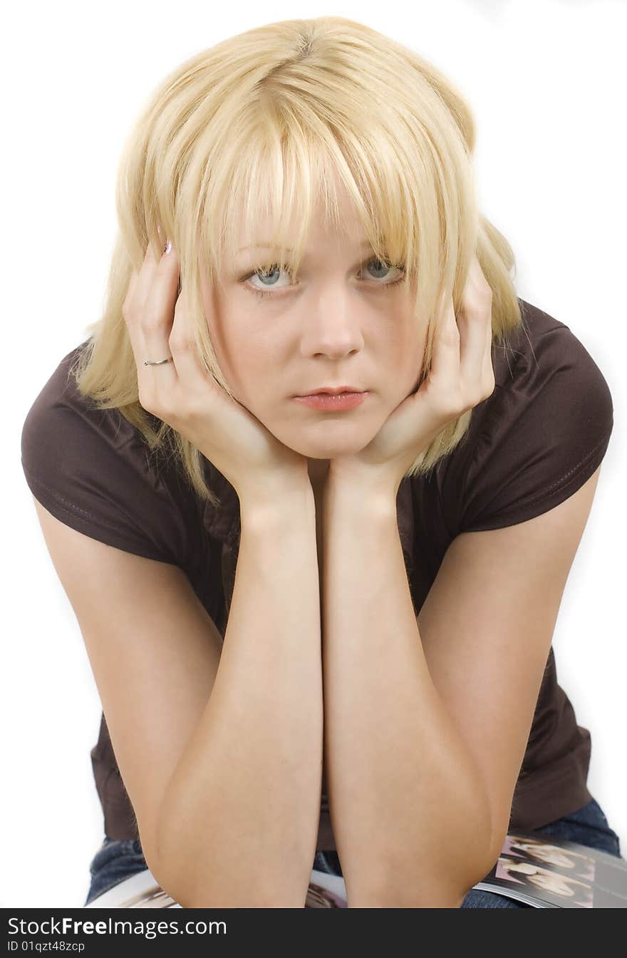 Portrait of the beautiful girl with blond hair and blue eyes on white. Portrait of the beautiful girl with blond hair and blue eyes on white