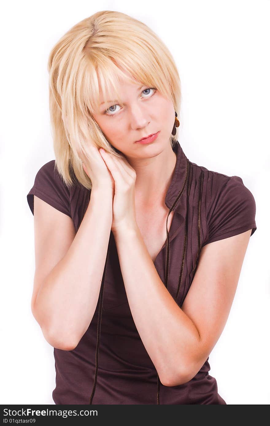 Portrait of the beautiful girl with blond hair and blue eyes on white. Portrait of the beautiful girl with blond hair and blue eyes on white