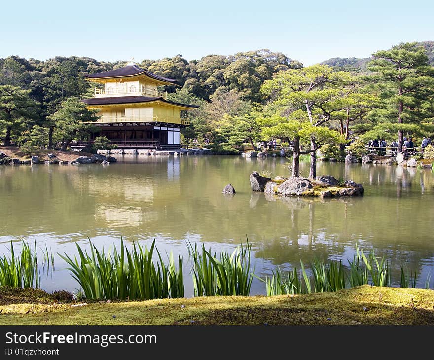 Gold pavilion in Kyoto (also called Kinkakuji) with image reflection in the lake. Gold pavilion in Kyoto (also called Kinkakuji) with image reflection in the lake