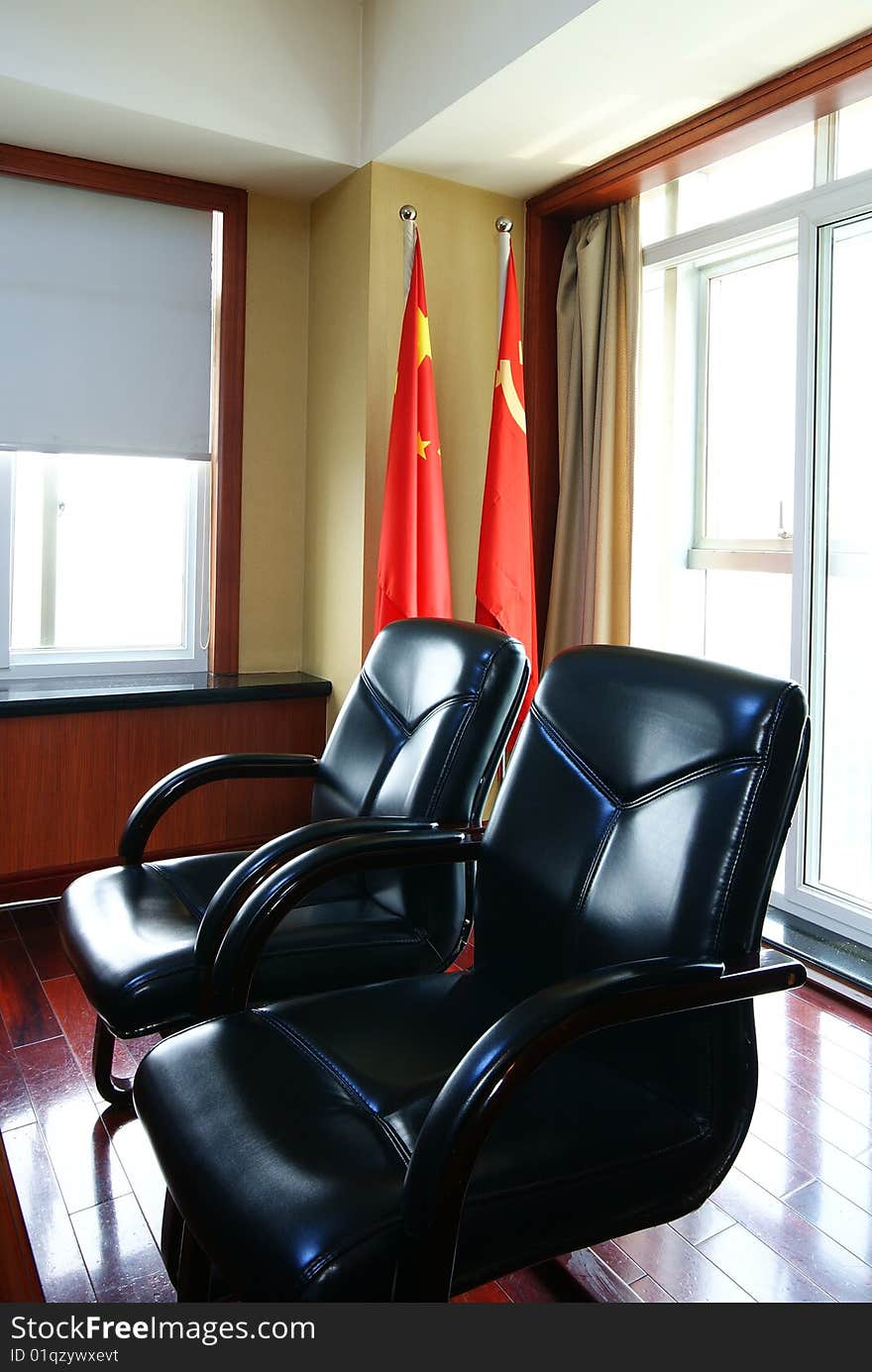 Office Seating Area with Chinese Flags