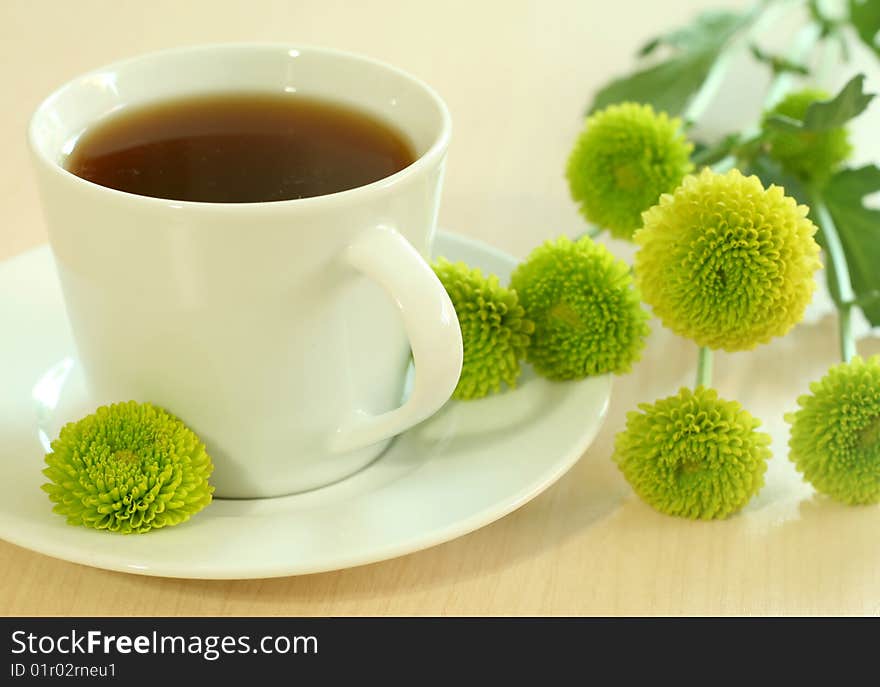 Cup of tea and flowers