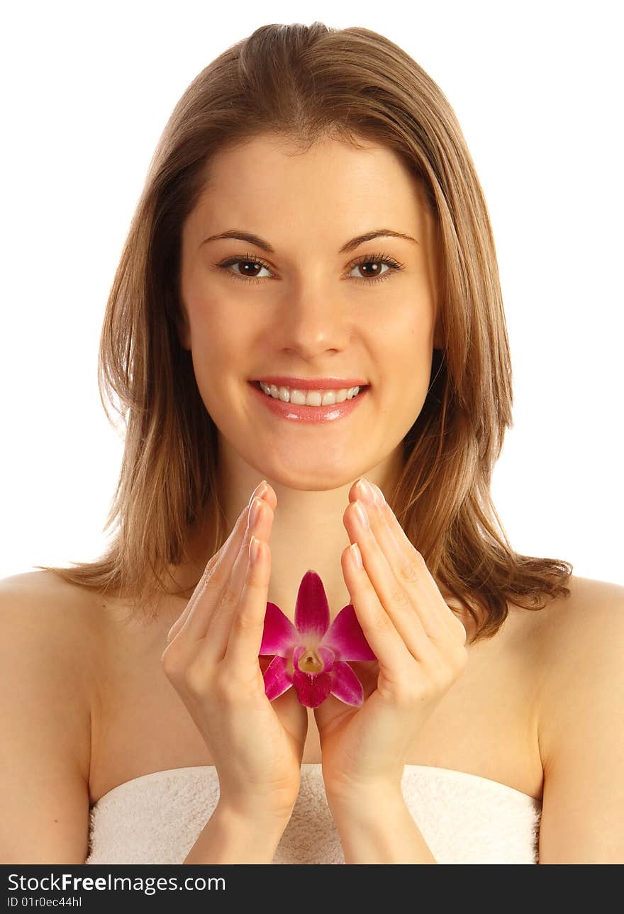 Beautiful girl with a flower. Isolated on white