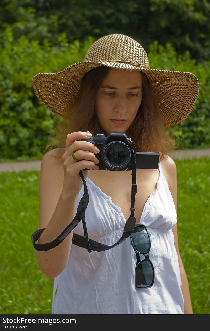 Girl taking photos outdoors