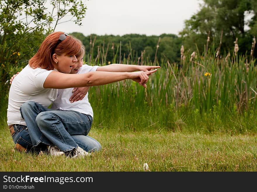 Mother and Daughter are happy in the park. Mother and Daughter are happy in the park