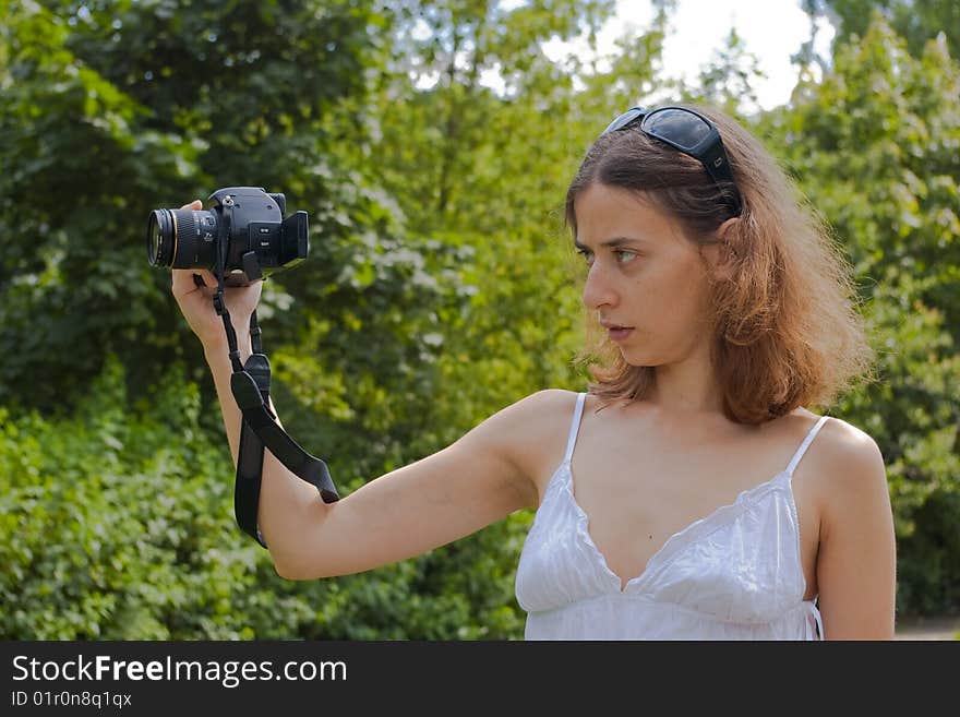 Girl taking photos outdoors