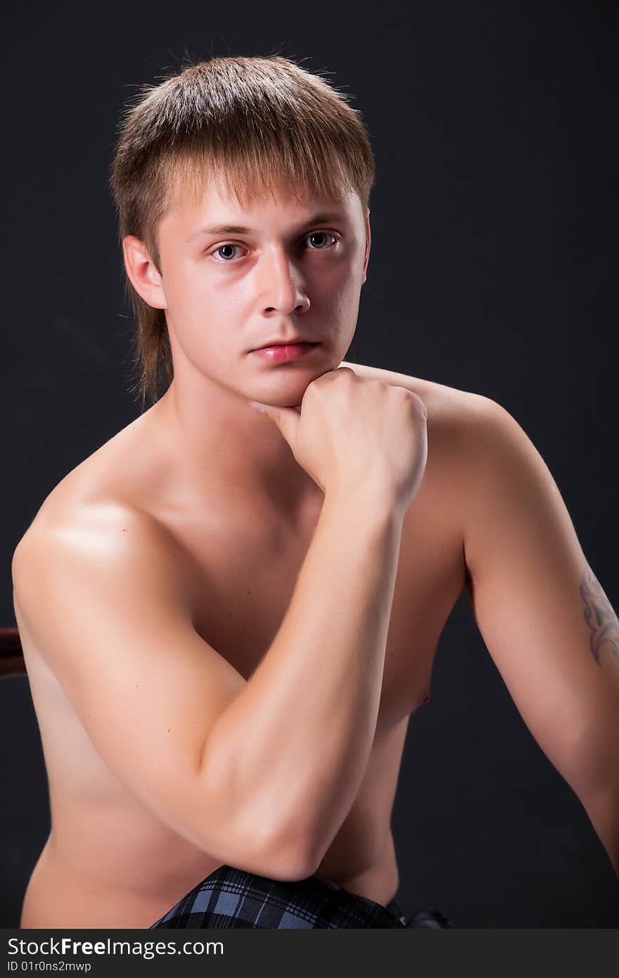 Young handsome man on black background. Young handsome man on black background