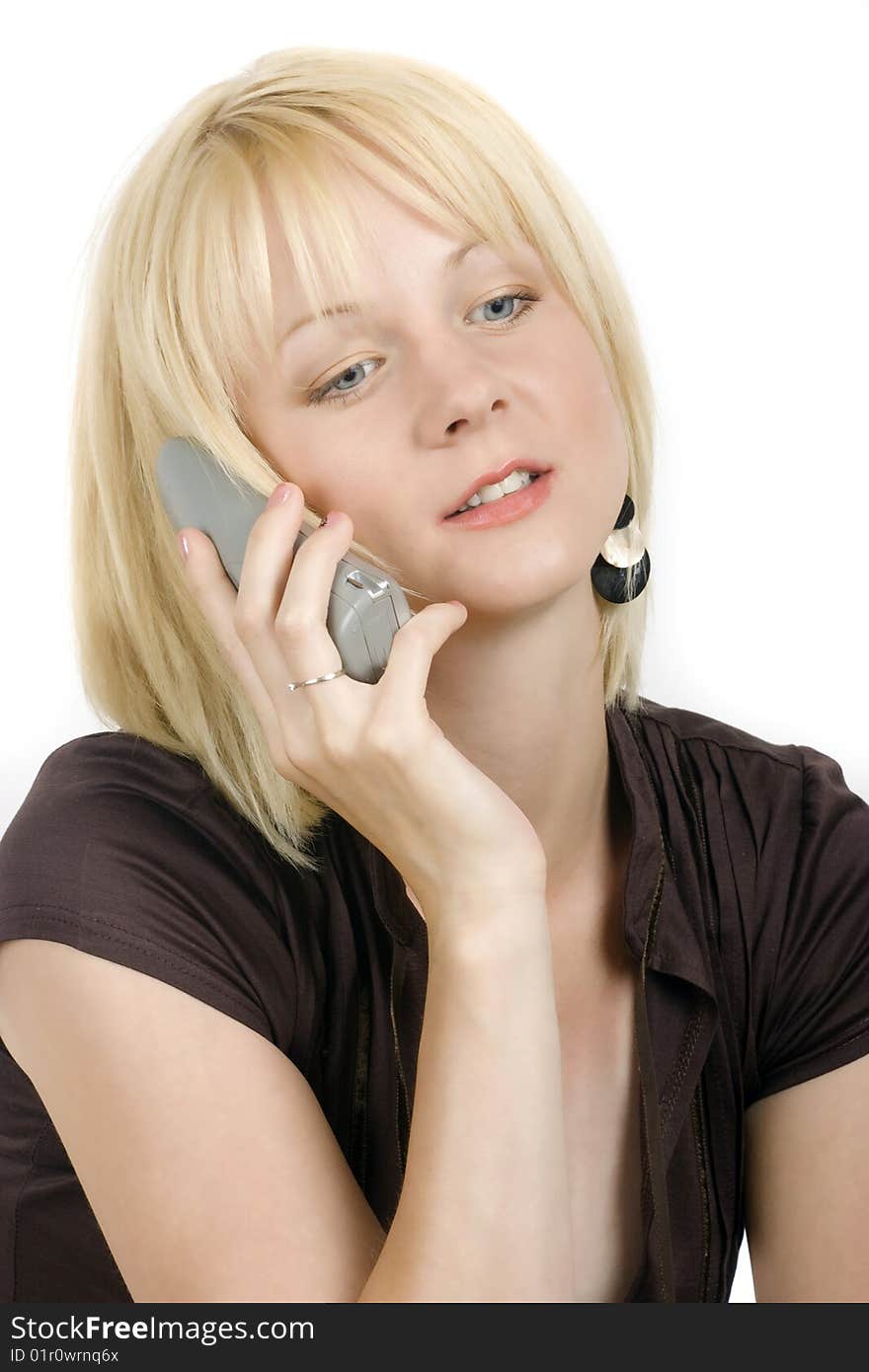 Portrait of the beautiful girl with blond hair calling. Portrait of the beautiful girl with blond hair calling