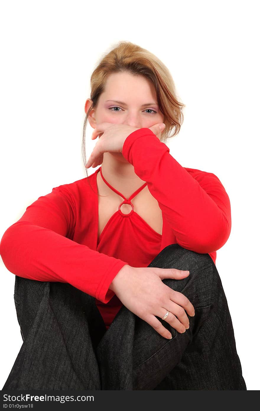 Portrait of young woman in red shirt, studio shot. Portrait of young woman in red shirt, studio shot